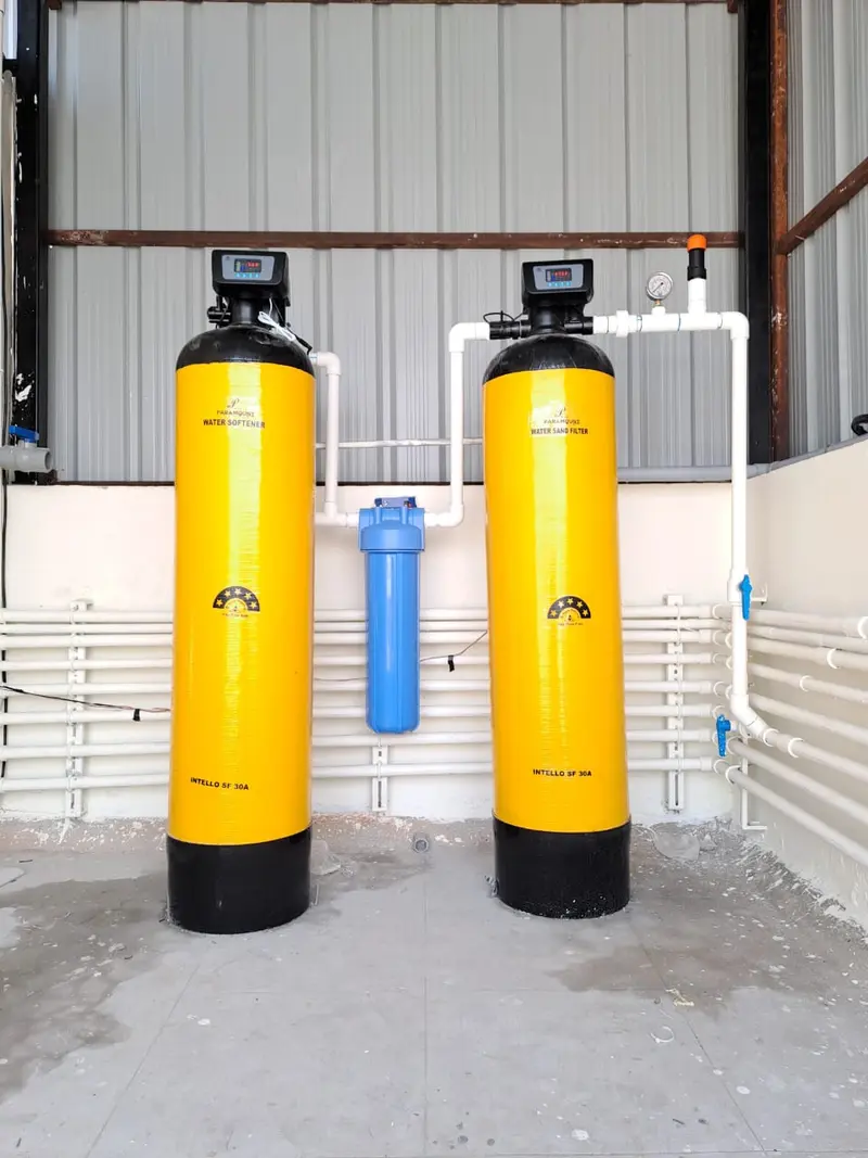 Two Evergreen Aqua vessels with control valves in a utility area